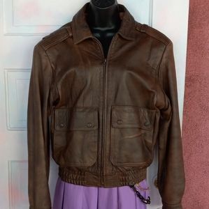 80's vintage Boho brown real leather coat w silk lining & rad pockets & buttons
